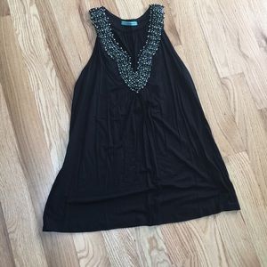 Black tank top with bead detailing around neck